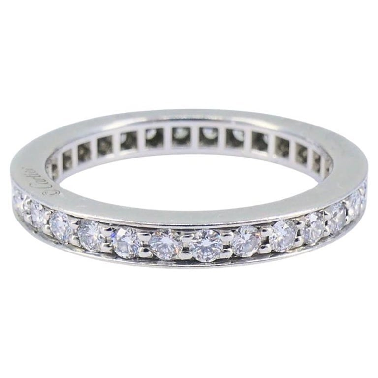 Vintage Cartier Diamond Band Platinum Size 4.5 (48): Title: Vintage Cartier Diamond Band Platinum Size 4.5 (48) Description: This vintage Cartier band ring is made in platinum and features a full circle of round brilliant-cut diamonds in a channel
