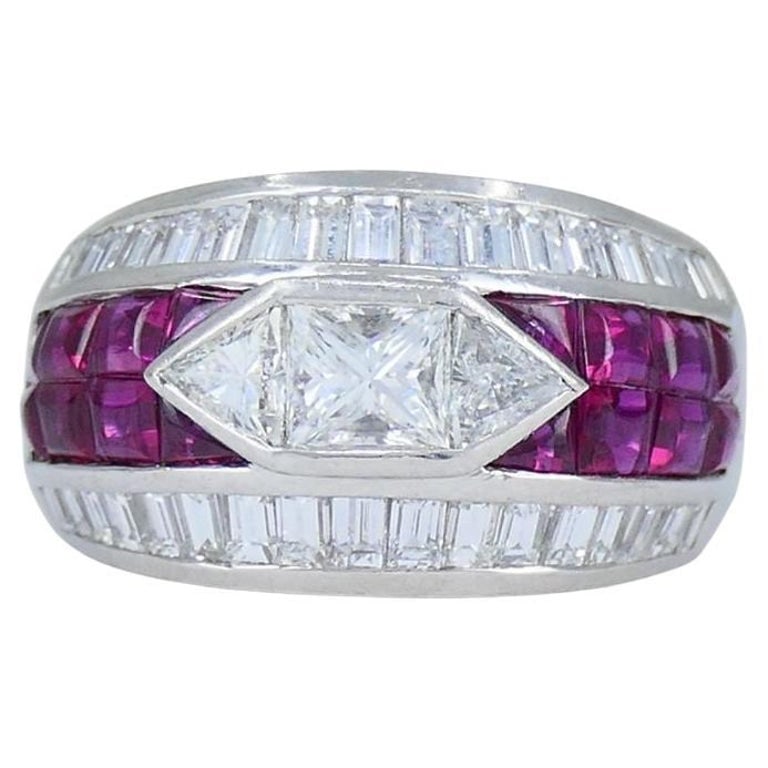 1960s Ruby Diamond Platinum Dome Ring 6.5: Title: 1960s Ruby Diamond Platinum Dome Ring 6.5 Description: This vintage dome ring, circa 1960s, is made of solid platinum and features a bold geometric design set with a total of 1.83 carats of