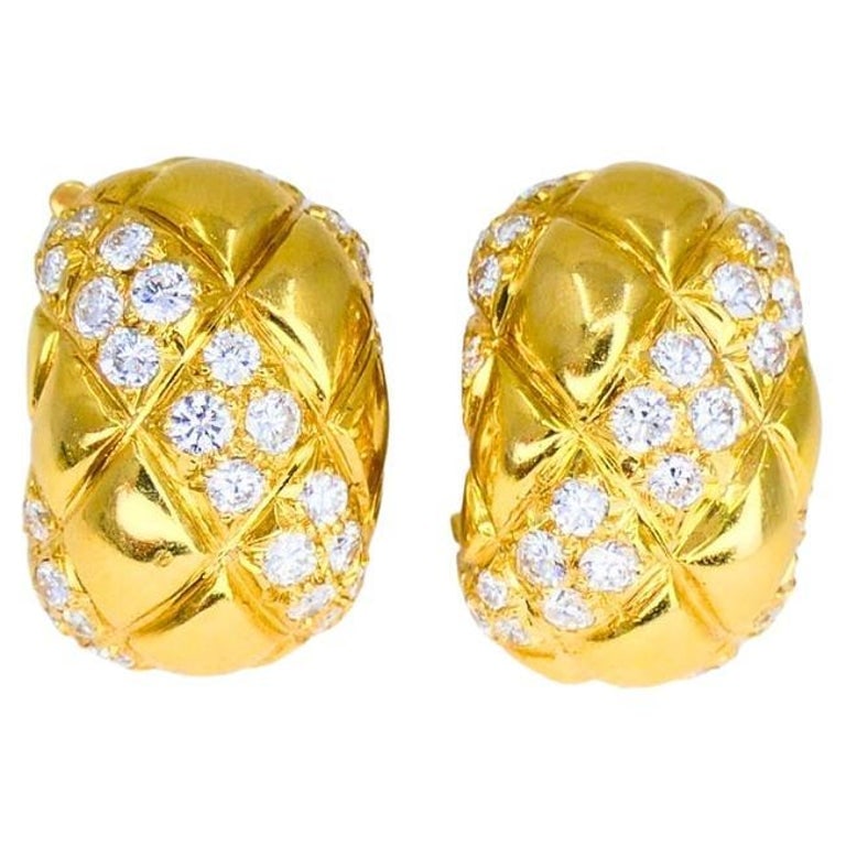 Van Cleef & Arpels 18k Gold Diamond Huggie Earrings Estate Jewelry: Title: Van Cleef & Arpels 18k Gold Diamond Huggie Earrings Estate Jewelry Description: A pair of Van Cleef & Arpels 18k gold and diamond huggie earrings. The earrings have a quilted design that adds