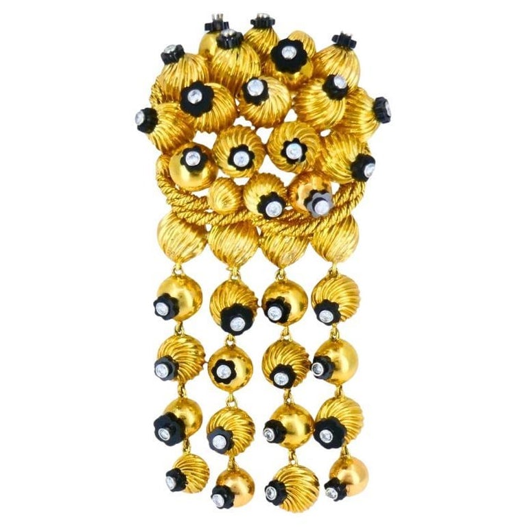 Onyx Gold Bead Brooch 18k Retro Jewelry Signed OSL: Title: Onyx Gold Bead Brooch 18k Retro Jewelry Signed OSL Description: A whimsical black onyx and gold bead brooch, circa 1950s. The brooch is designed as a cluster of rounded gold beads, alternating