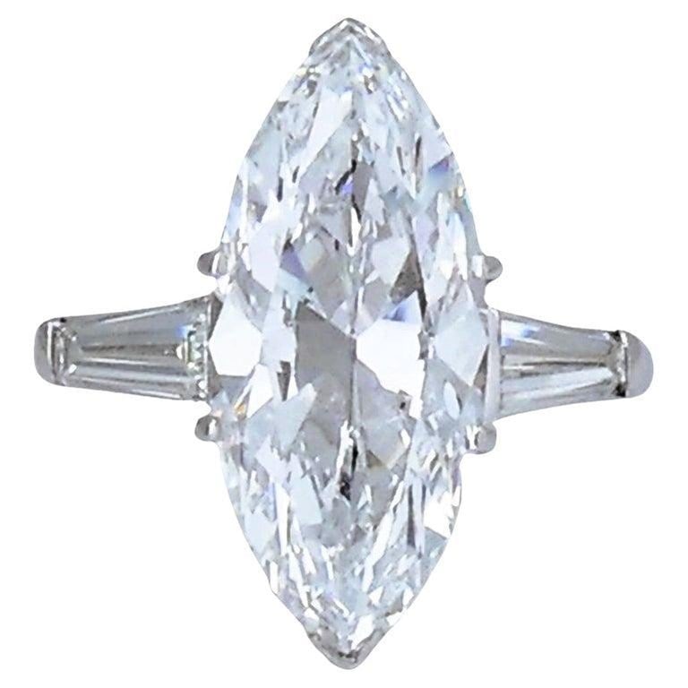 Van Cleef & Arpels Marquise Diamond Platinum Ring GIA 5.11-carat D VVS2 VCA: Title: Van Cleef & Arpels Marquise Diamond Platinum Ring GIA 5.11-carat D VVS2 VCA Description: A spectacular platinum ring by Van Cleef & Arpels, featuring a GIA-graded marquise diamond complemented