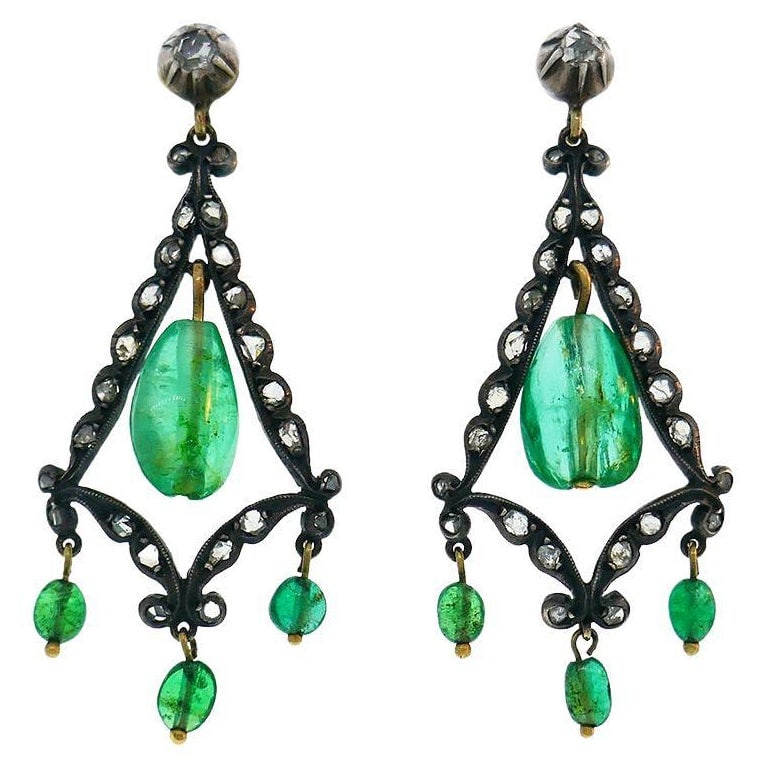 Georgian Emerald Silver 10k Gold Dangle Earrings Antique: Title: Georgian Emerald Silver 10k Gold Dangle Earrings Antique Description: Beautiful earrings featuring beaded emeralds set in silver and 10 karat yellow gold and accented with rose cut diamonds. Me