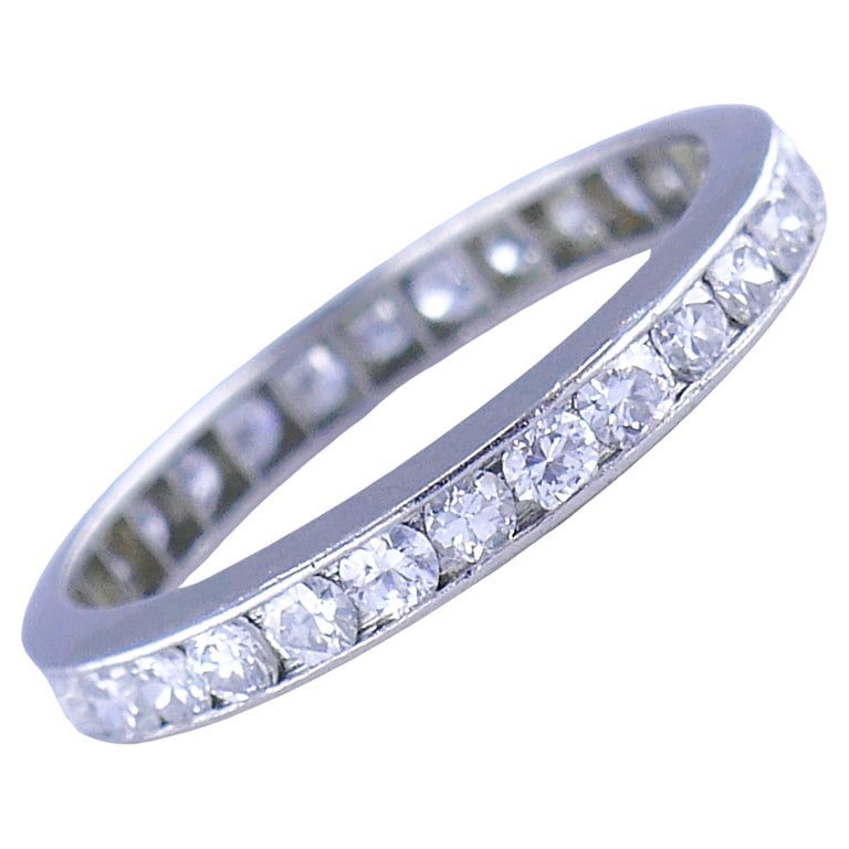 Art Deco Ring Eternity Band Platinum Diamond Estate Jewelry: Title: Art Deco Ring Eternity Band Platinum Diamond Estate Jewelry Description: An Art Deco ring designed as an eternity band, made of platinum with diamonds. The gemstones are channel set, Old Europe