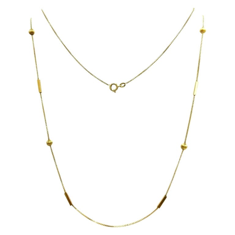 Vintage 18k Yellow Gold Ball Box Chain Necklace: Title: Vintage 18k Yellow Gold Ball Box Chain Necklace Description: Vintage 18k yellow gold box chain featuring hammered gold balls and polished gold rectangular prism elements. Stamped with a hallmar