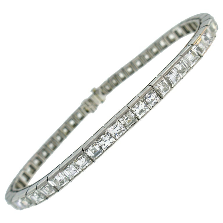 Tiffany & Co. Diamond Platinum Tennis Line Bracelet, 1950s: Title: Tiffany & Co. Diamond Platinum Tennis Line Bracelet, 1950s Description: Stunning diamond and platinum tennis bracelet created by Tiffany & Co. in the 1950s. The bracelet features forty-four