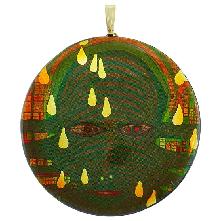 Hundertwasser Wood Lacquer Pendant: Title: Hundertwasser Wood Lacquer Pendant Description: Colorful pendant created by Austrian artist Friedensreich Hundertwasser. The pendant measures 2-1/8 inches (5.5 cm) in diameter. Signed