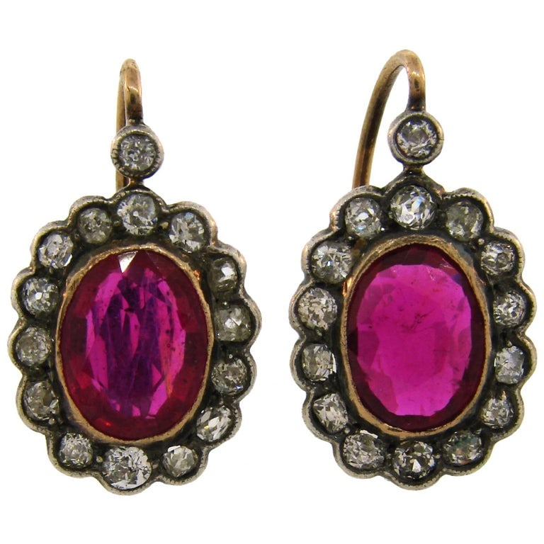 Ruby Diamond Silver Gold Cluster Drop Stud Earrings: Title: Ruby Diamond Silver Gold Cluster Drop Stud Earrings Description: Gorgeous pair of cluster earrings featuring rubies and diamonds. Classic and timeless earrings that are a great addition to