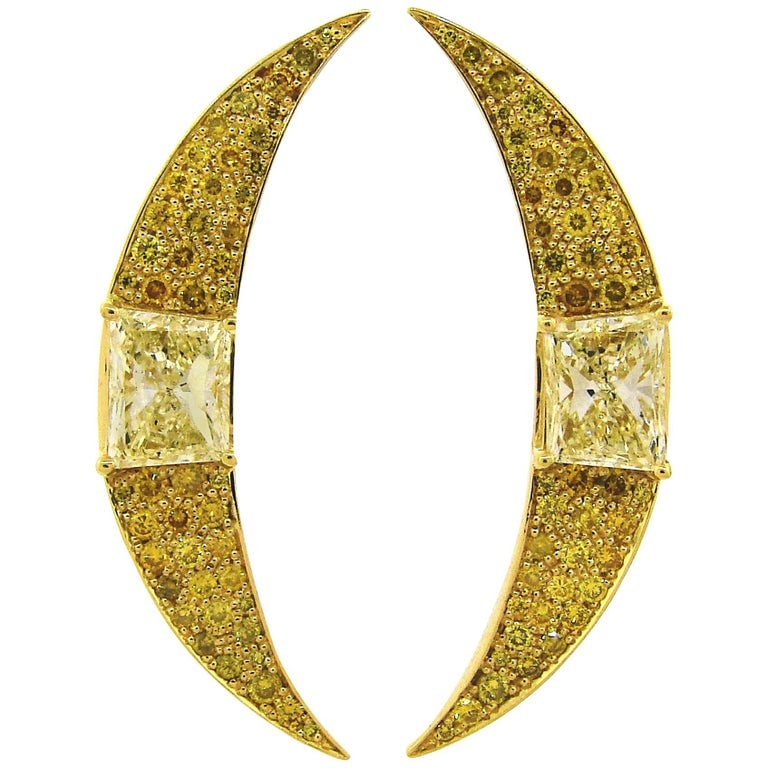 Fancy Yellow Diamond Gold Earrings: Title: Fancy Yellow Diamond Gold Earrings Description: A pair of gorgeous crescent earrings. Chic and elegant, they are a great addition to your jewelry collection. Made of 17 karat (tested) yellow