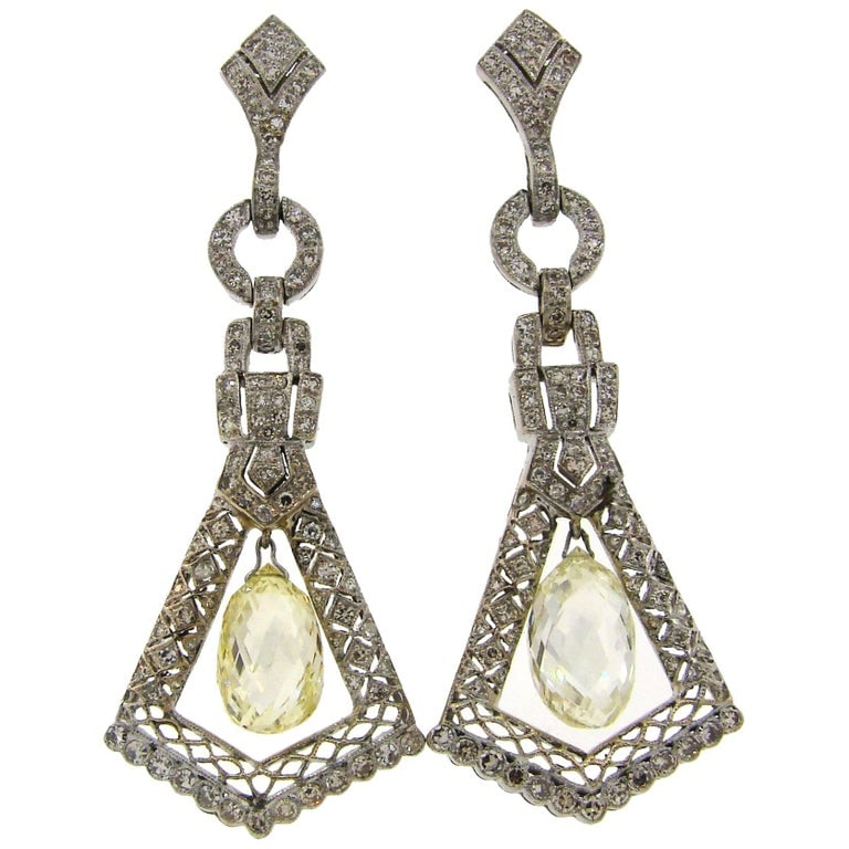 Diamond White Gold Dangle Earrings: Title: Diamond White Gold Dangle Earrings Description: A pair of fabulous dangle earrings featuring two diamond briolettes set in 14 karat (tested) white gold. The briolettes measure 10.91 x 6.92 x