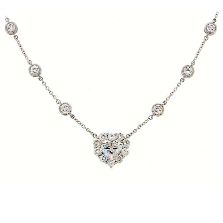 Heart Shaped Diamond GIA Gold Pendant Necklace: Title: Heart Shaped Diamond GIA Gold Pendant Necklace Description: Dazzling diamond necklace that is a great gift to express your love and appreciation for your beloved one. It is features a 2.14-cara