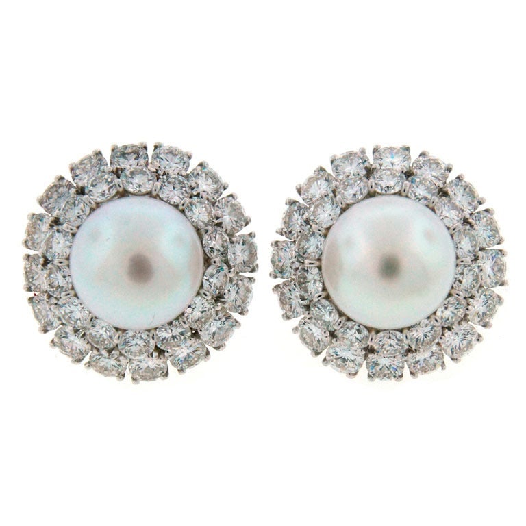 Harry Winston Pearl Diamond & Platinum Earrings: Title: Harry Winston Pearl Diamond & Platinum Earrings Description: Exquisite dressy earrings created by Harry Winston. Feature a beautiful white South Sea button pearl surrounded with two rows of fin