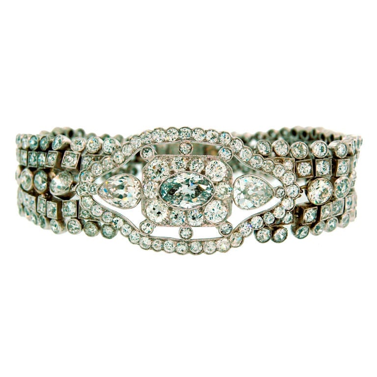 Art Deco Diamond Bracelet with Light Fancy Blue Marquise Diamond: Title: Art Deco Diamond Bracelet with Light Fancy Blue Marquise Diamond Description: Timeless Art Deco diamond and platinum bracelet created in Europe in the 1930s. Its highlight is an approx. 1.32-ct