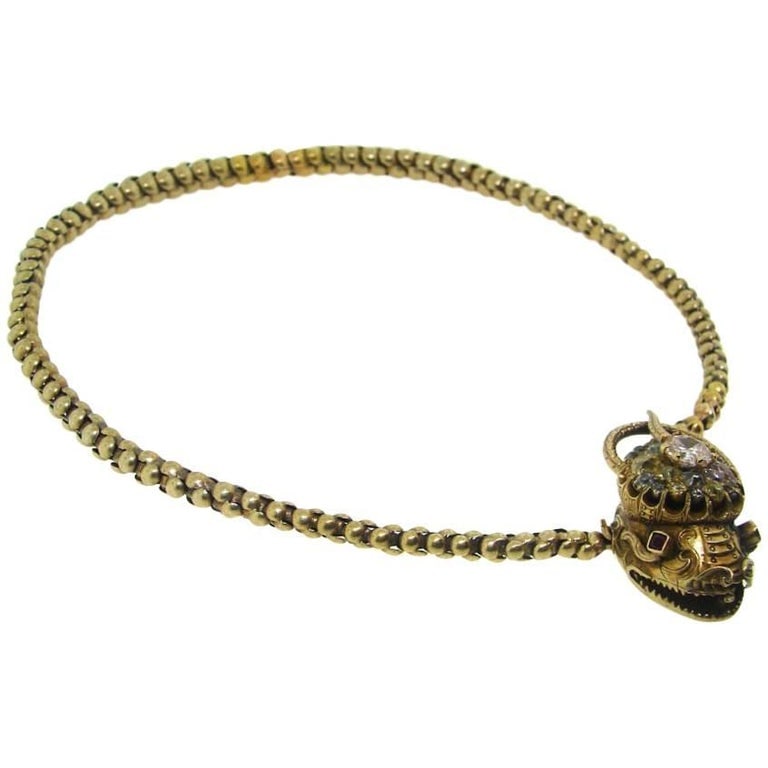 Antique Natural Fancy Color Diamond Snake Necklace: Title: Antique Natural Fancy Color Diamond Snake Necklace Description: Unique Victorian Yellow Gold Snake Necklace with Fourteen Natural Fancy Color Diamonds. Each diamond comes with a GIA Diamond Gra
