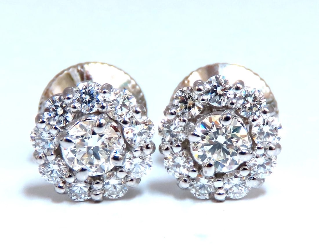 1ct. natural round diamond cluster earrings 14 karat: Title: 1ct. natural round diamond cluster earrings 14 karat Description: Cluster diamond earrings. 1 carat natural round diamonds G - color vs2 clarity 14 karat white gold 2.4 grams Earrings measure