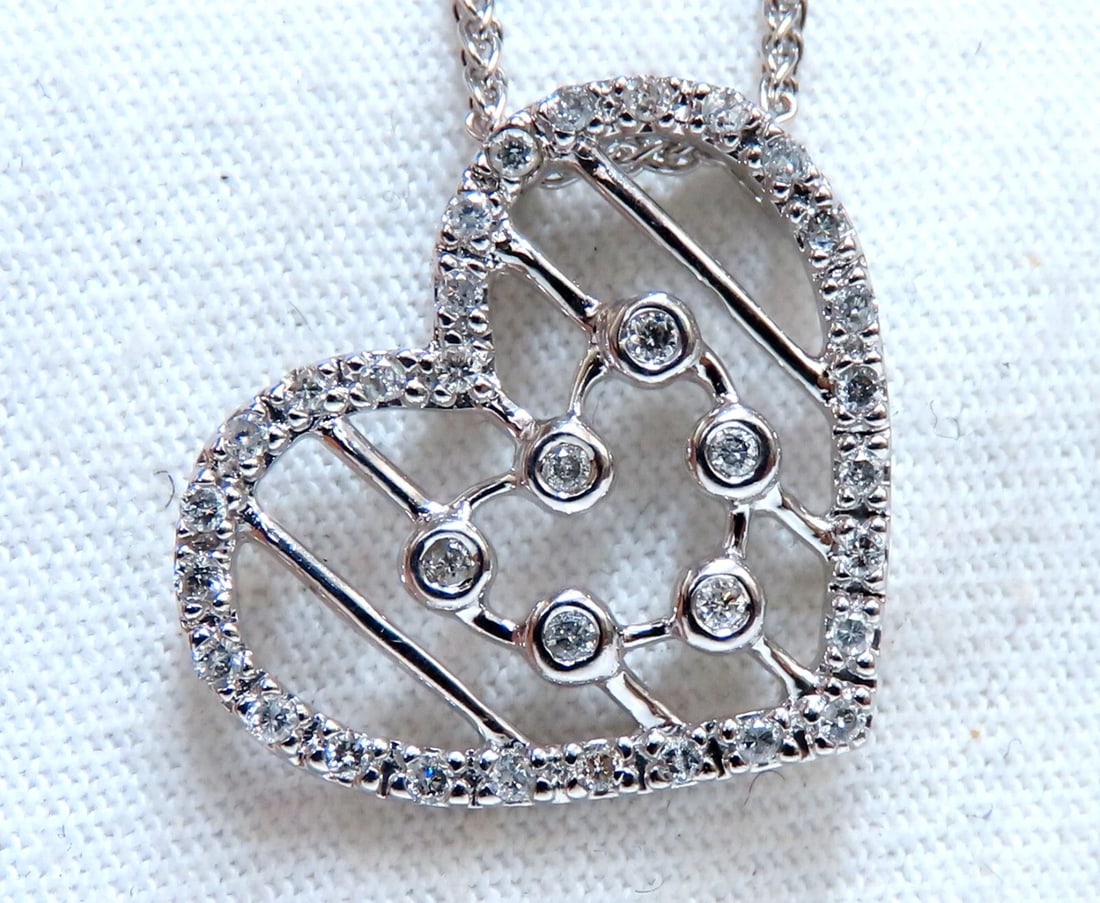 .26ct Heart Natural diamonds necklace 14 karat: Title: .26ct Heart Natural diamonds necklace 14 karat Description: Loves & Sparkles. .22ct. Natural diamonds heart necklace. Full cut and Brilliant H-color, si2 clarity Pendant Measurements: 19 x 17mm