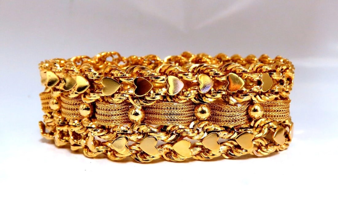14kt Gold Hearts Rope & Tassel Vintage Hand winded Intricate Bracelet: Title: 14kt Gold Hearts Rope & Tassel Vintage Hand winded Intricate Bracelet Description: Heart Rope and Mesh Weave Vintage Bracelet Amazing Intricate Detail 22mm Diameter 14 karat yellow gold 87.5