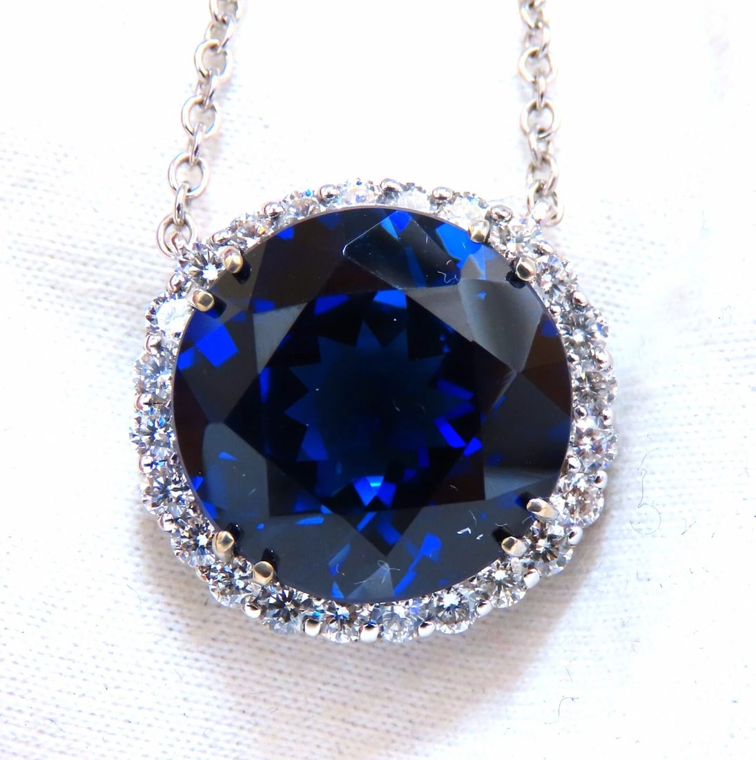 20.09ct Lab Round Blue Sapphire Diamonds pendant 14kt: Title: 20.09ct Lab Round Blue Sapphire Diamonds pendant 14kt Description: MAGNIFICENT JEWELS 20.09ct. Lab Created Sapphire Pendant Royal Blue Color clean clarity & transparent Brilliant Round cut Diam
