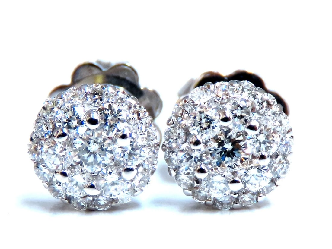 .70ct. natural round diamond cluster earrings 14 karat gold: Title: .70ct. natural round diamond cluster earrings 14 karat gold Description: cluster diamond earrings. .70 carat natural round diamonds G -H color vs2 clarity 14 karat white gold 2.2 g Earrings mea
