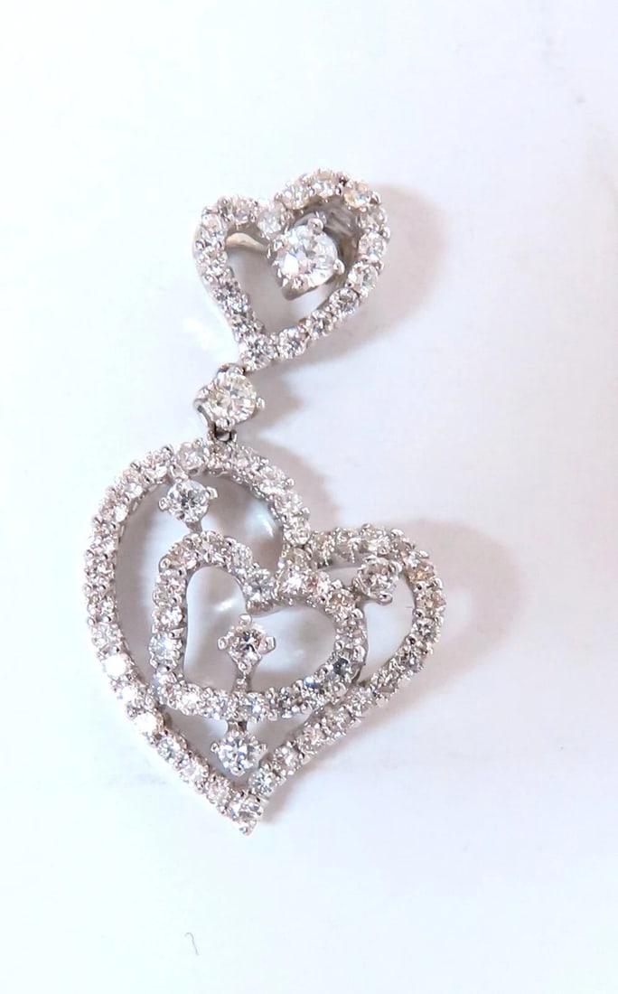 1.02ct Natural Round Diamonds Double Heart pendant 14kt: Title: 1.02ct Natural Round Diamonds Double Heart pendant 14kt Description: 1.02ct natural round diamond heart necklace Double dangle hearts G color vs2 clarity Overall measurements 1.1x .60 inch 3.5