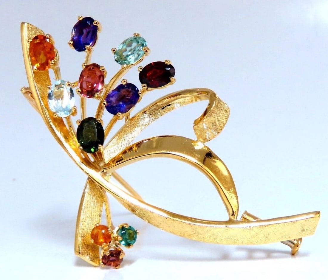 Natural Tourmaline Aquamarine Citrine Amethyst Garnet Bundle Pin 18kt Gold: Title: Natural Tourmaline Aquamarine Citrine Amethyst Garnet Bundle Pin 18kt Gold Description: 5ct. Gem Bundle Design Pin Green Tourmaline, Aquamarine, Citrine, Amethyst & Garnet. Pin measures: 59 x 3
