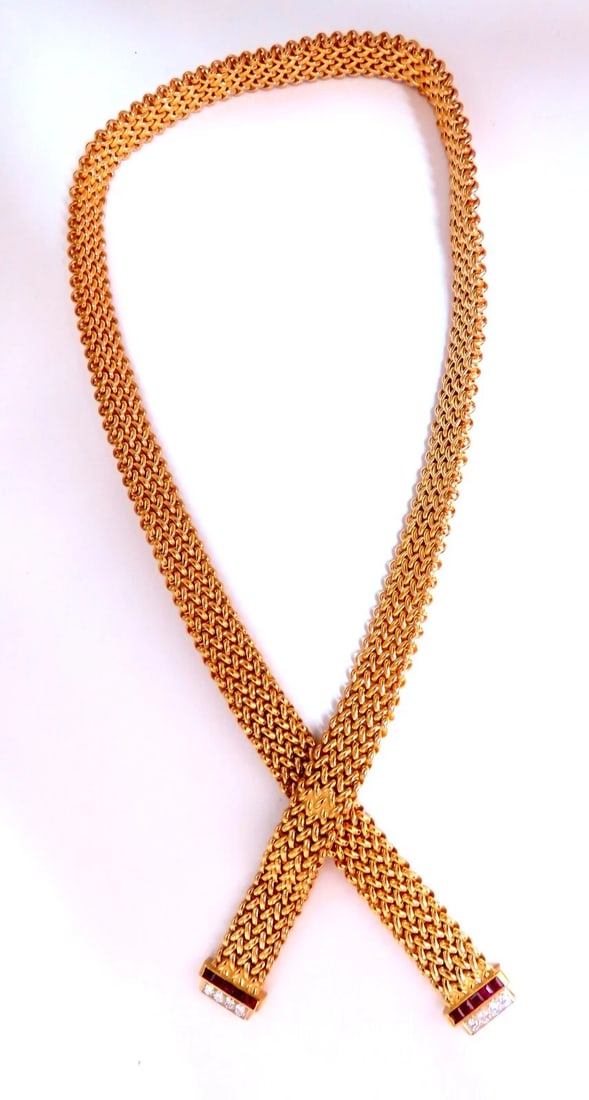 Ribbon Wrap Heavy Tight Cable Linked Ruby Diamond Necklace 14k 105 Gram: Title: Ribbon Wrap Heavy Tight Cable Linked Ruby Diamond Necklace 14k 105 Gram Description: Cable Tight Ribbon Flat .50ct Natural Emerald cut Ruby necklace. .50ct. Natural Round diamonds. G-color