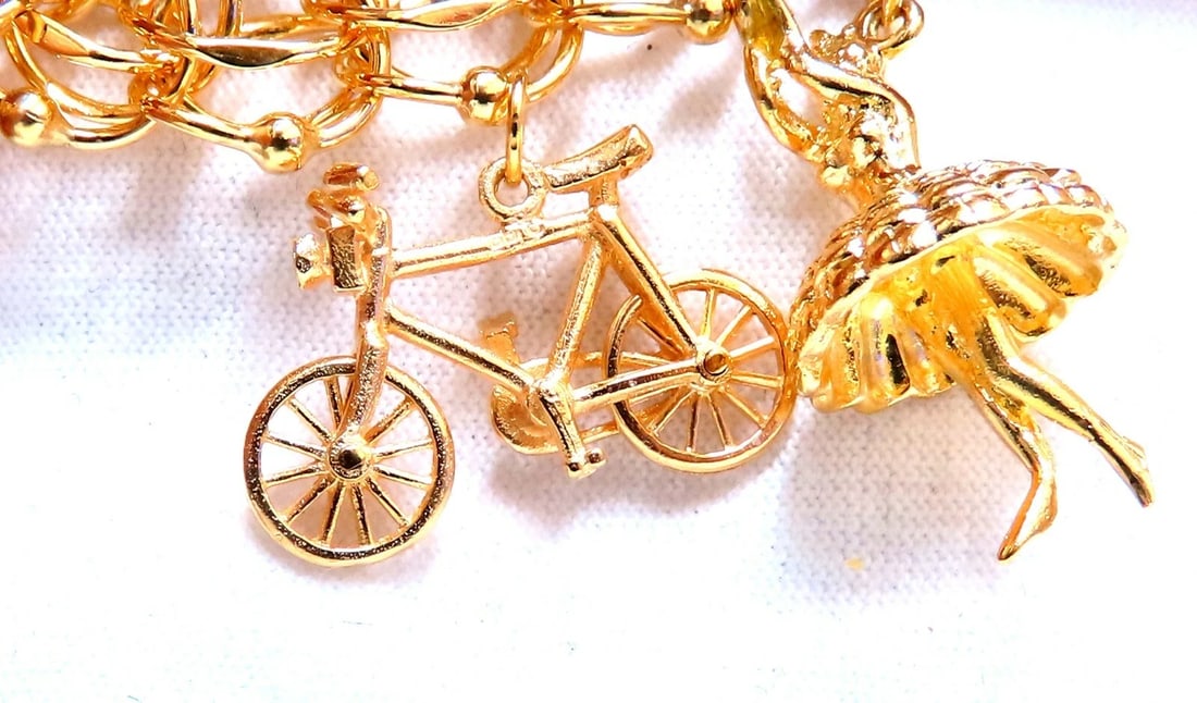 Nine Charms Link Bracelet 14kt gold 7 inch 54gm - 7