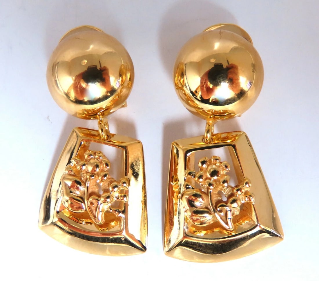 Ball Dome Dangle Deco Earrings 14kt Gold: Title: Ball Dome Dangle Deco Earrings 14kt Gold Description: Contemporary Dangle Earrings Measurements: 1.30 inch long .50 inch wide circle Comfortable Clip posts 11.6 grams / 14kt. Yellow Gold Earrin