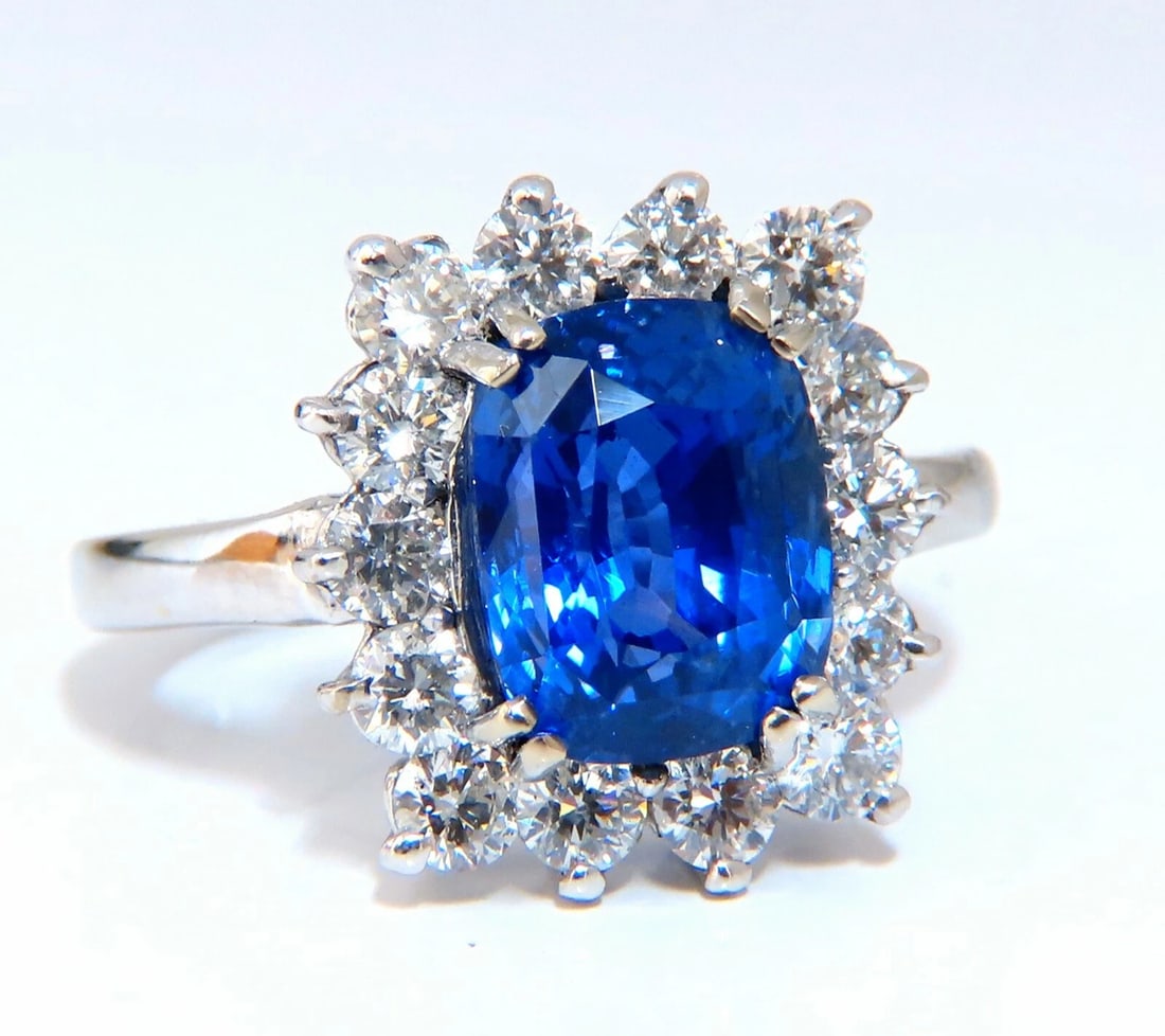 GIA Certified 5.05ct Natural No Heat Color change Sapphire Diamonds Ring 14kt: Title: GIA Certified 5.05ct Natural No Heat Color change Sapphire Diamonds Ring 14kt Description: Halo Cluster Cocktail Royale GIA Certified 5.05ct. Natural Sapphire ring. Report: 5181699389 (to