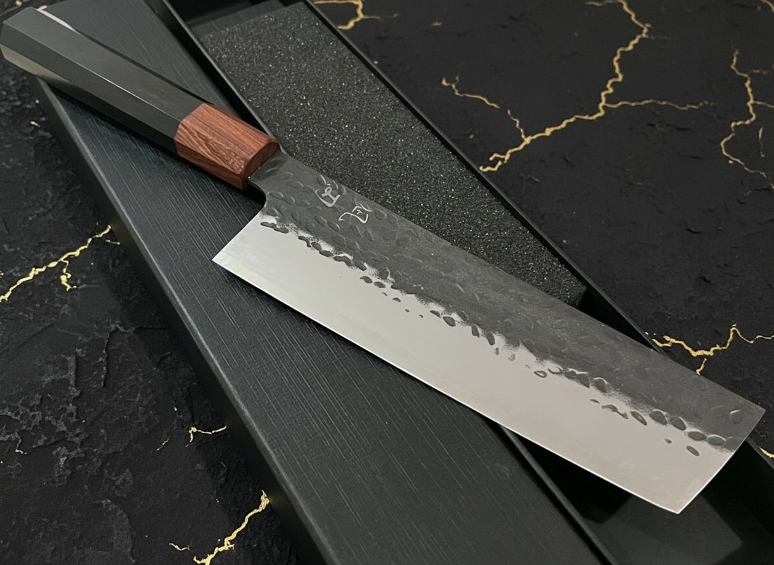 7" Hammered Vegetable Cleaver, 9Cr18 Steel Kurouchi Nakiri, Wood Handle: Title:7" Hammered Vegetable Cleaver, 9Cr18 Steel Kurouchi Nakiri, Wood Handle Description:This traditional Japanese-style vegetable knife is crafted for precise vegetable preparation. Specifications: