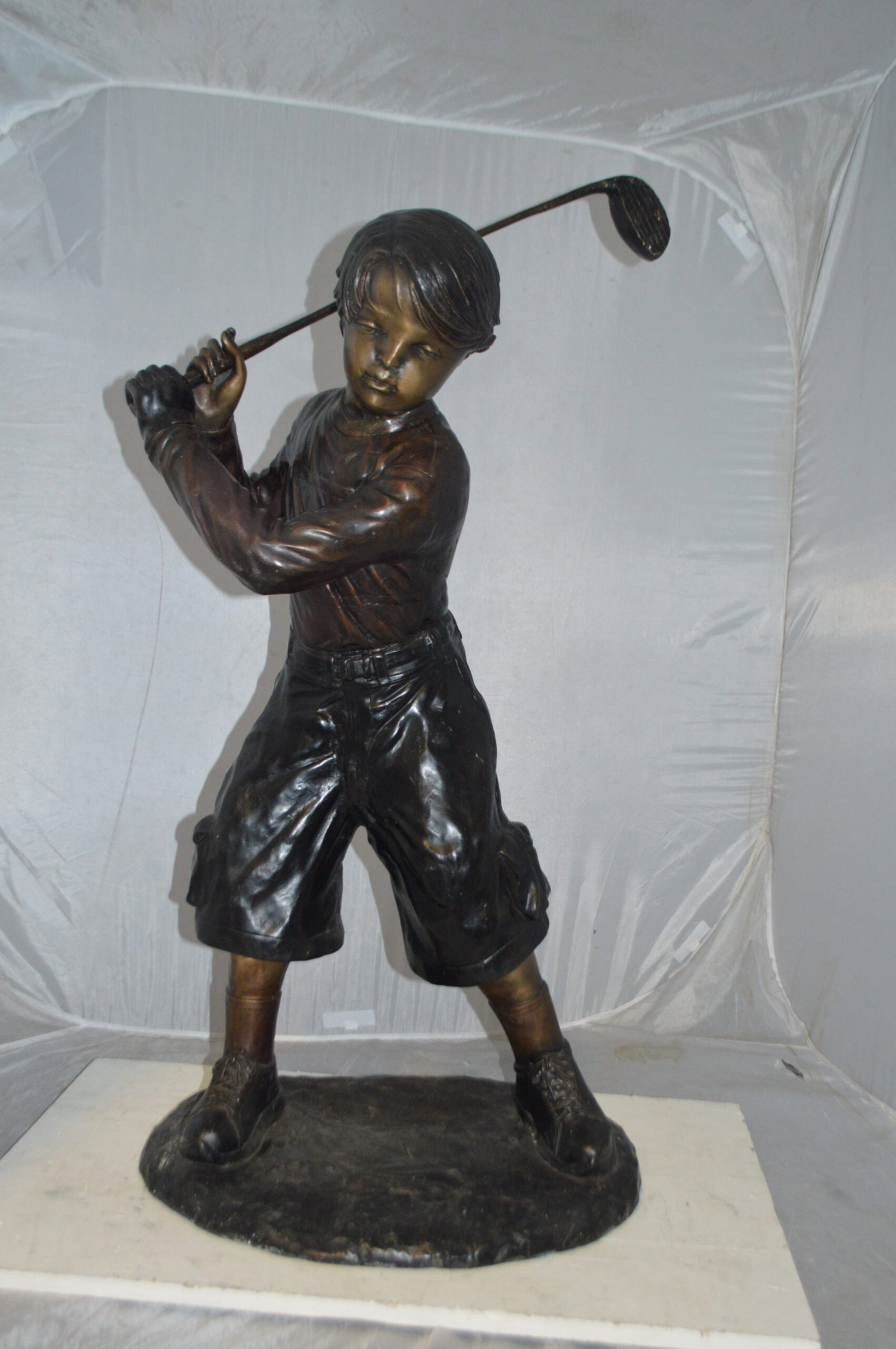 Young Boy Plays Golf Bronze Statue - Size: 19"L x 21"W x 45"H. - 4
