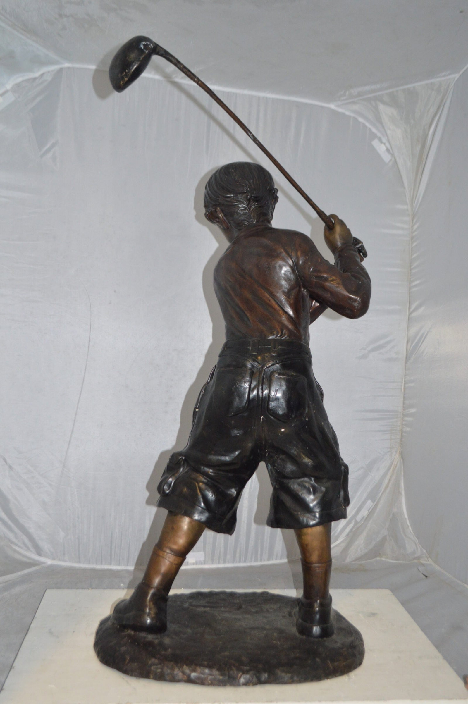 Young Boy Plays Golf Bronze Statue - Size: 19"L x 21"W x 45"H. - 8
