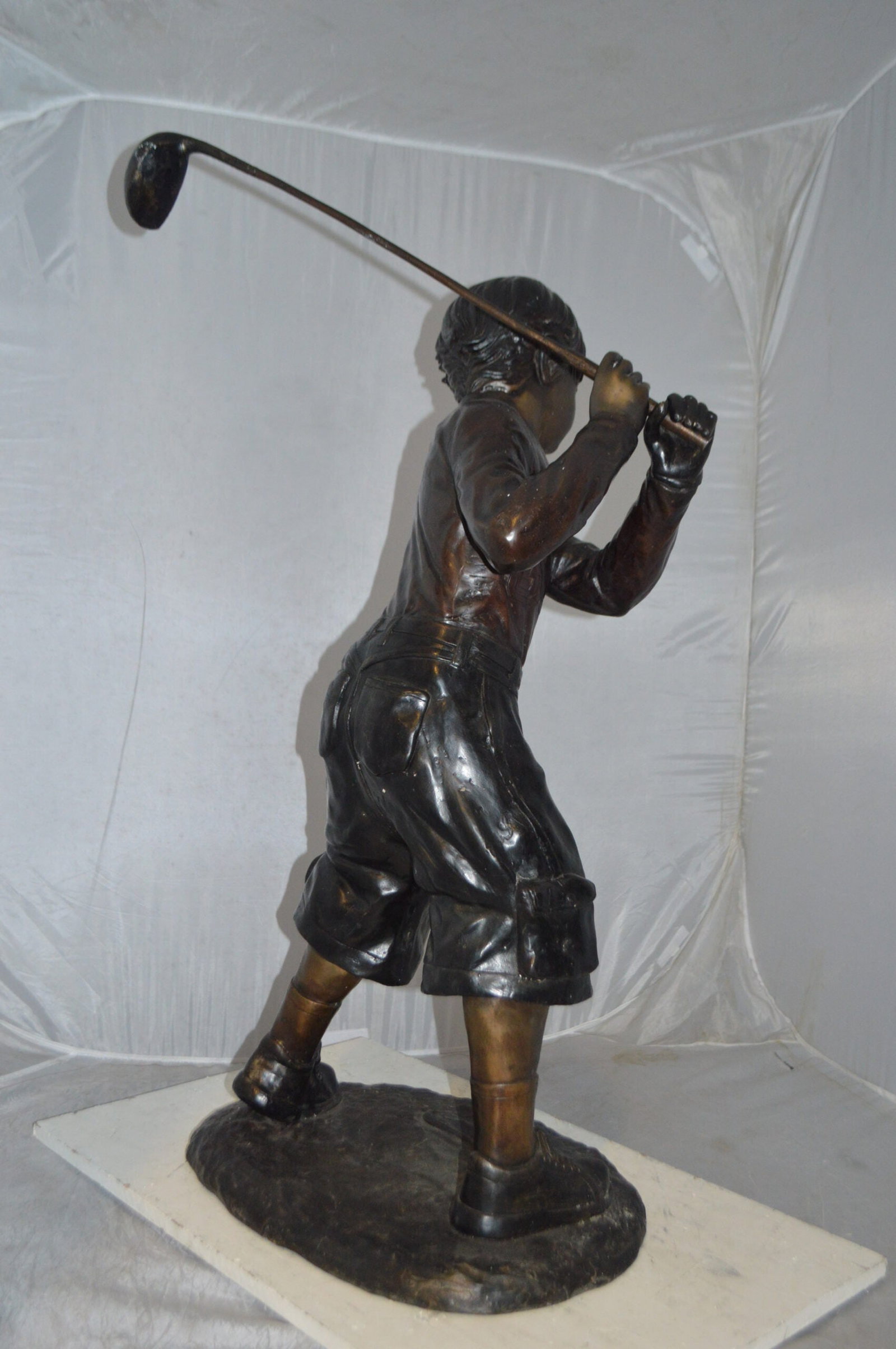 Young Boy Plays Golf Bronze Statue - Size: 19"L x 21"W x 45"H. - 9