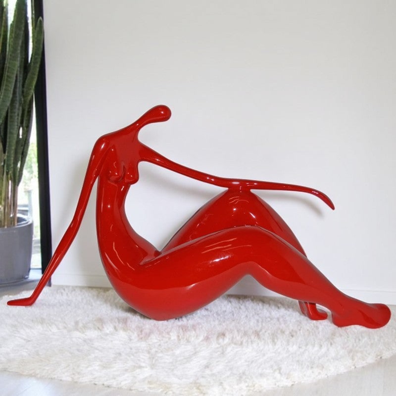Modern Art Red Women on the Beach Resin Statue - Size: 28"L x 8"W x 16"H.: Title:Modern Art Red Women on the Beach Resin Statue - Size: 28"L x 8"W x 16"H. Description:Enjoy this happy looking modern art, resin statue of a Red Women on the Beach. This modern abstract would