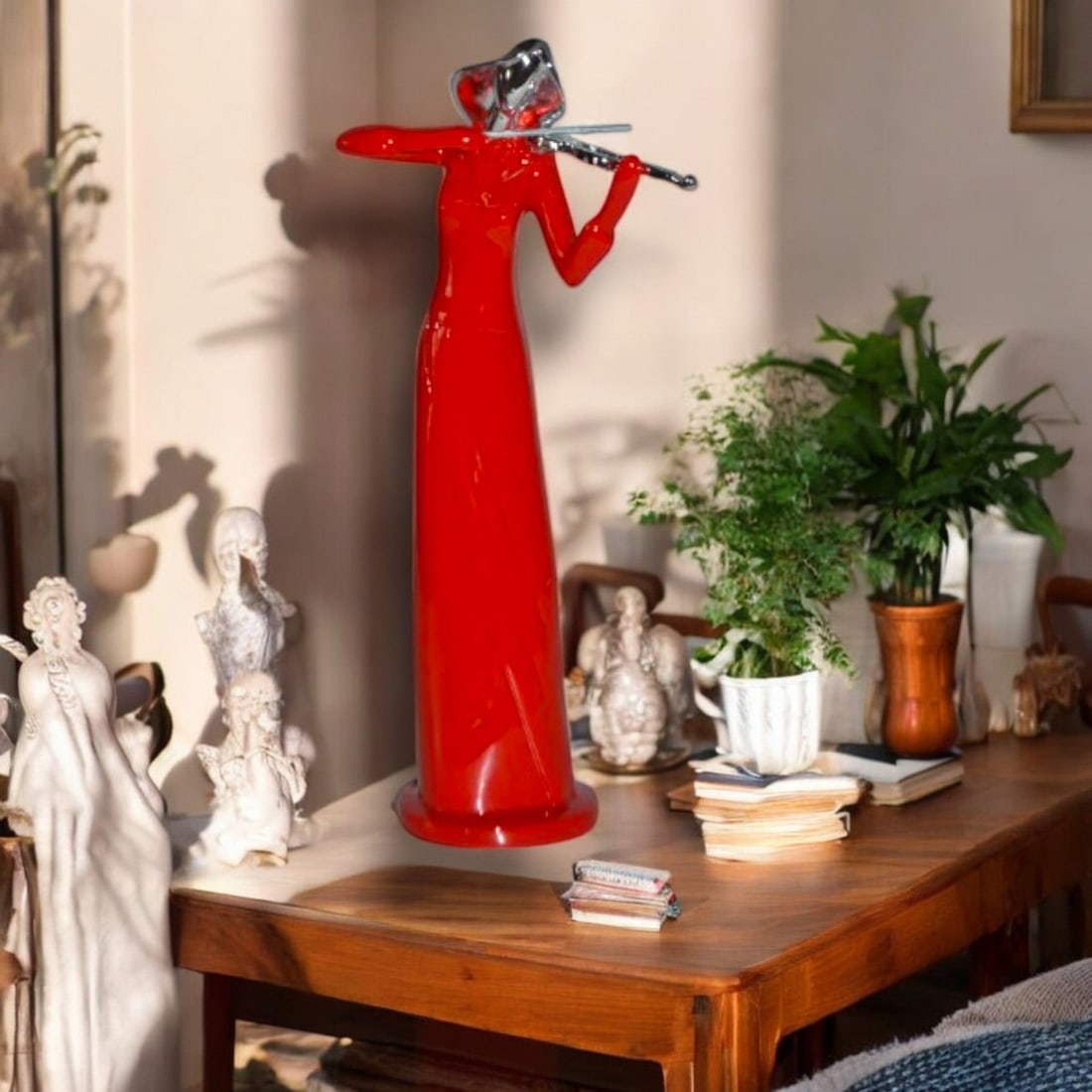 Women Playing the Violin Red and Chrome Resin Statue - Size: 5"L x 4"W x 12"H.: Title:Women Playing the Violin Red and Chrome Resin Statue - Size: 5"L x 4"W x 12"H. Description:The beautiful modern art resin statue colored red with shiny chrome violin and head of a Musical Girl