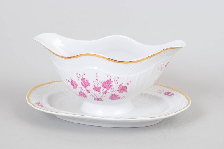 Hollohaza, Hungary. Sauce boat in white porcelain with pink floral decoration and gilt rim. Mid-20th (1 of 4)