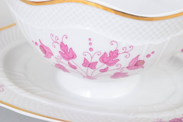 Hollohaza, Hungary. Sauce boat in white porcelain with pink floral decoration and gilt rim. Mid-20th - 2