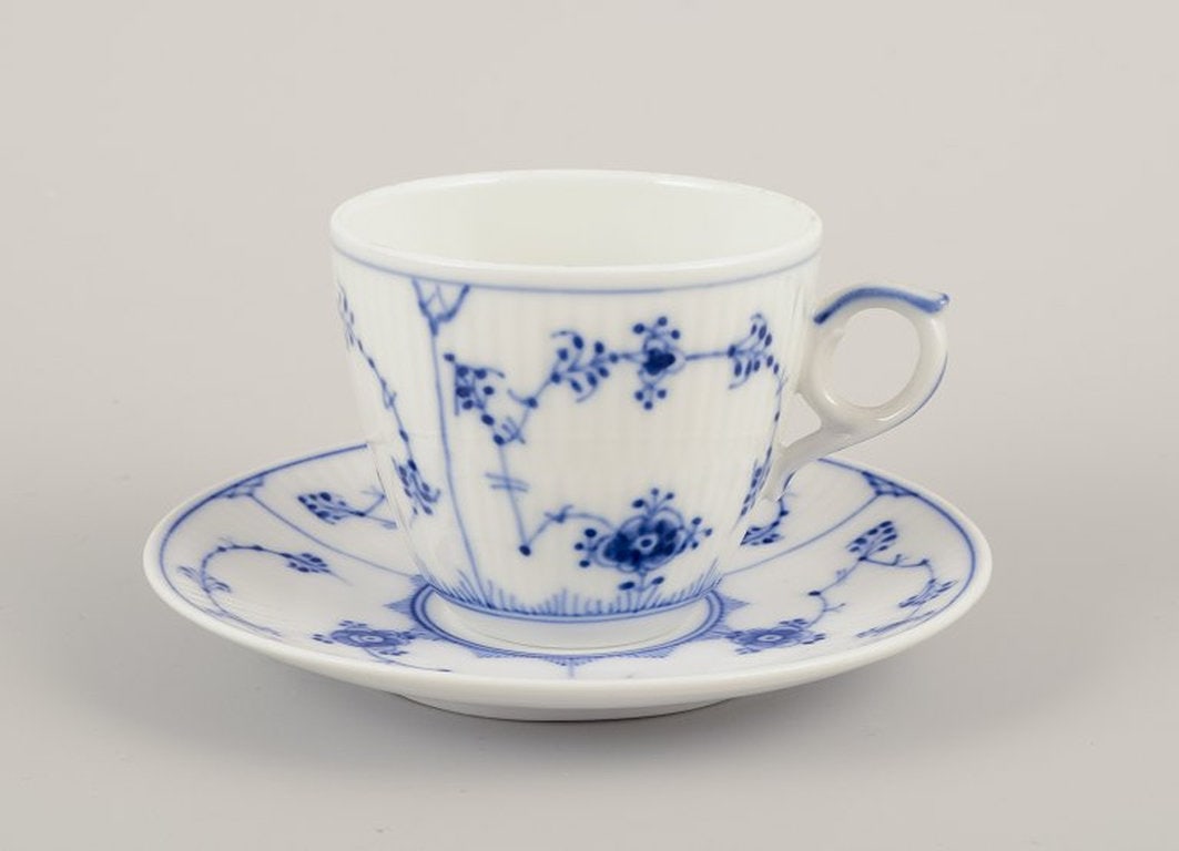 Royal Copenhagen Blue Fluted Plain. A set of four porcelain coffee cups with saucers. 1969-1984. - 2