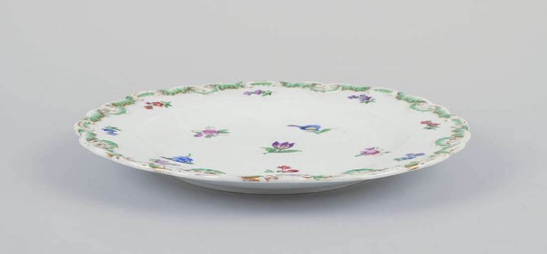 Meissen, Germany. A set of four antique porcelain plates. 19th century. - 2