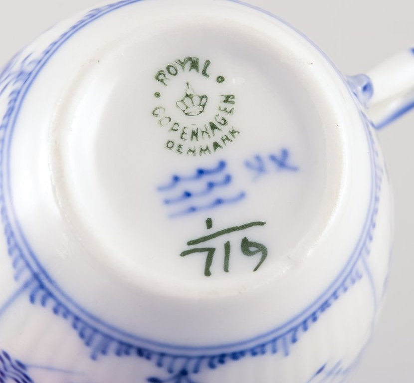 Royal Copenhagen Blue Fluted Half Lace. Four pairs of porcelain coffee cups and saucers. Approx - 6