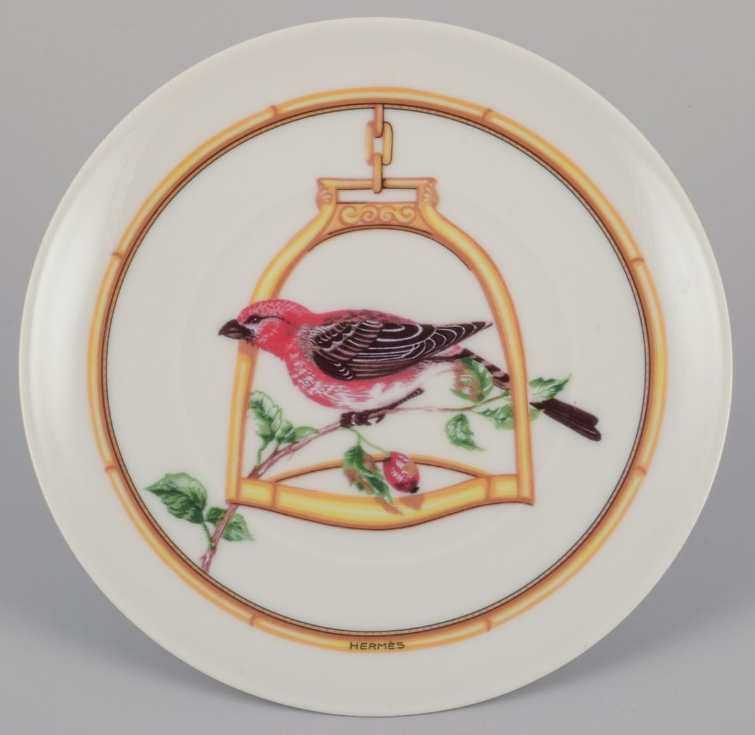 Hermes, France. Two porcelain plates with bird motifs. "L'etrier Perchoir" series. Late 20th C. - 2