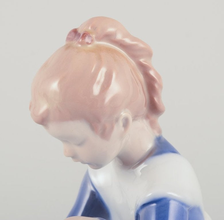 Bing & Grøndahll, Denmark. Porcelain figurine. Sitting girl tying a shoelace. Mid-20th century. - 3