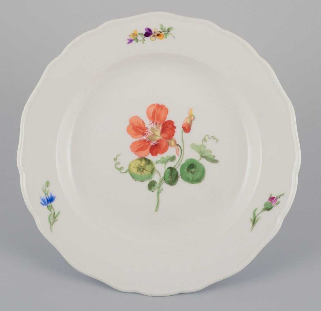 Meissen, Germany. A set of four porcelain dinner plates with floral motifs. Approx. from 1900. - 2