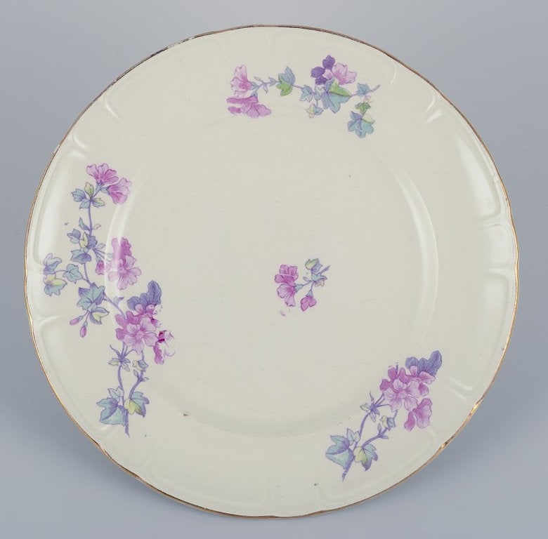 Gustafsberg, Sweden. A set of six 'Geranium' faience dinner plates. 1918. - 2