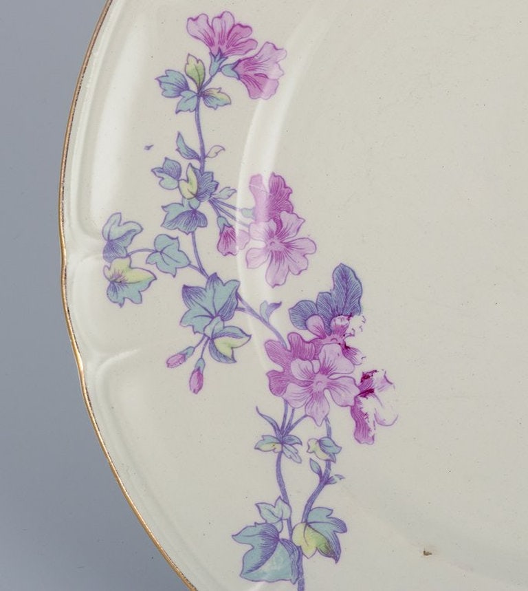 Gustafsberg, Sweden. A set of six 'Geranium' faience dinner plates. 1918. - 3