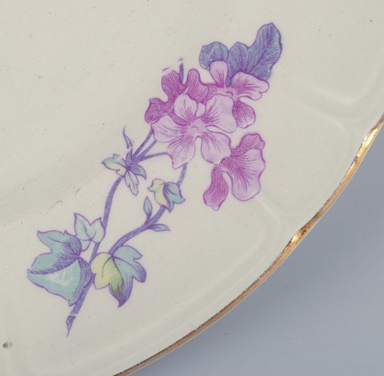 Gustafsberg, Sweden. A set of six 'Geranium' faience dinner plates. 1918. - 4