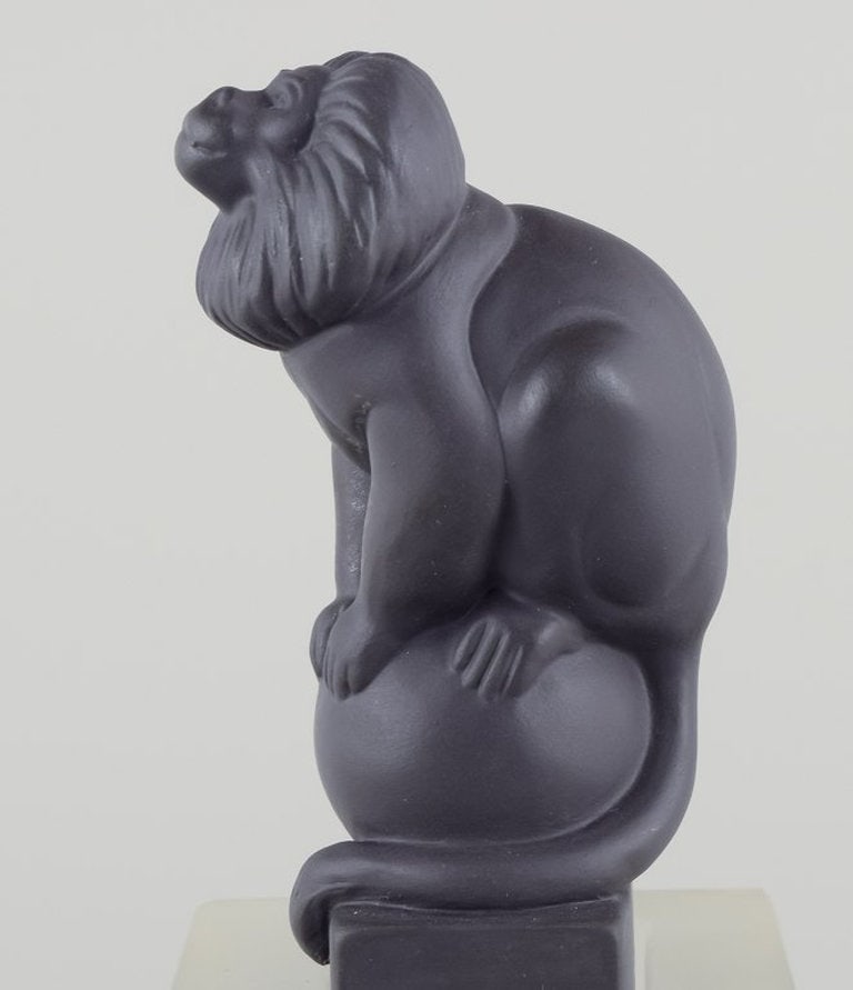 Pia Langelund for Royal Copenhagen. Black bisquit, monkey figurine mounted on a frosted glass base. - 6