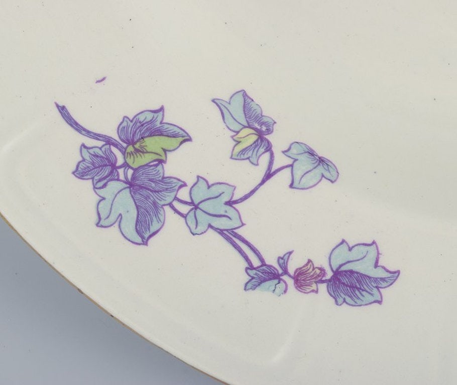 Gustafsberg, Sweden. A set of six deep 'Geranium' earthenware plates. 1918. - 4