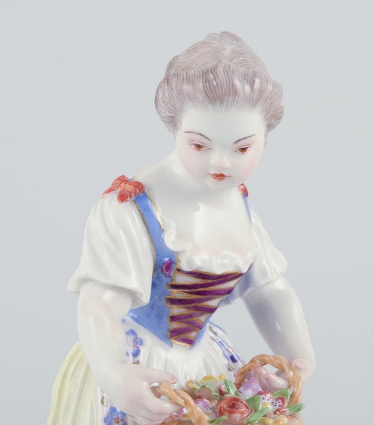 Meissen, Germany. Porcelain figurine of girl with basket. Ca. 1900. - 2