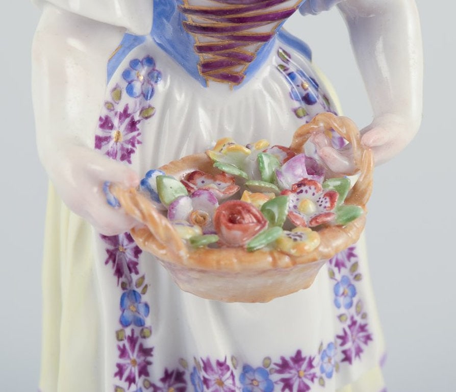 Meissen, Germany. Porcelain figurine of girl with basket. Ca. 1900. - 5