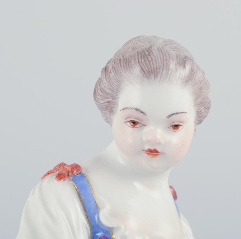 Meissen, Germany. Porcelain figurine of girl with basket. Ca. 1900. - 6